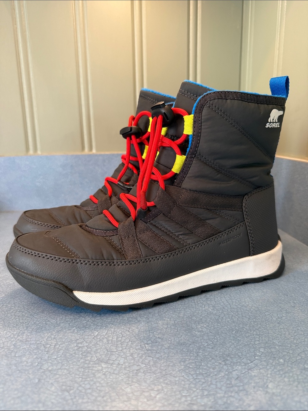 Sorel Kids' Black Boots with Red Laces and Blue Trim